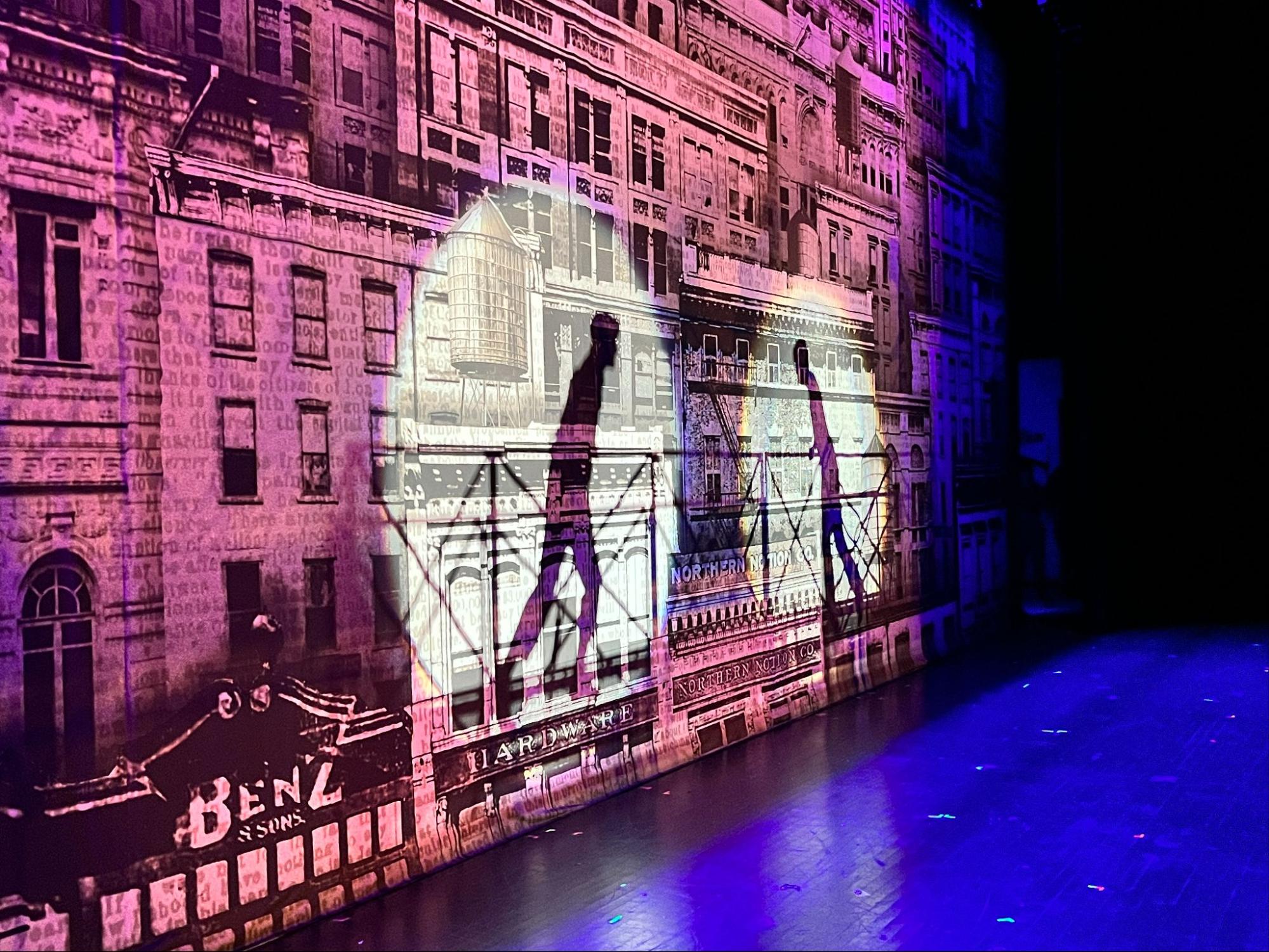 Newsies city projection and silhouette treatment